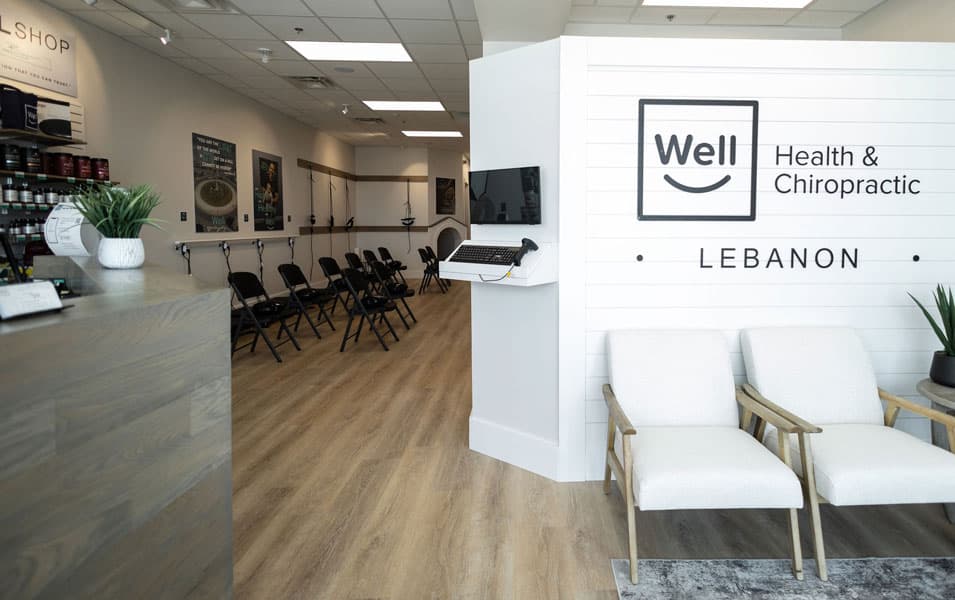 Reception seating and Well Health & Chiropractic Lebanon sign