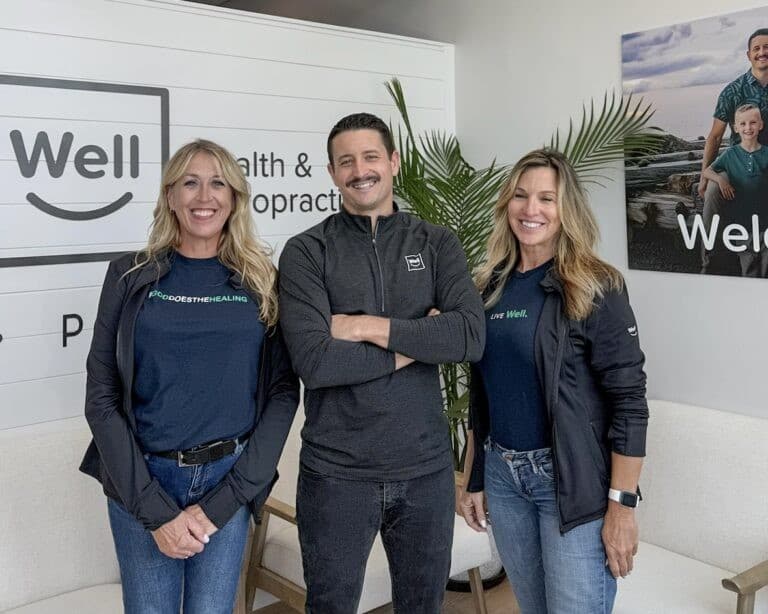 Three Well Health team members together at their clinic