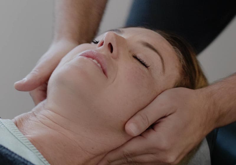 A patient receiving a chiropractic adjustment.